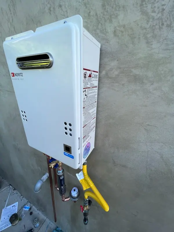 Tankless water heater installation for Lake Cove Village homes